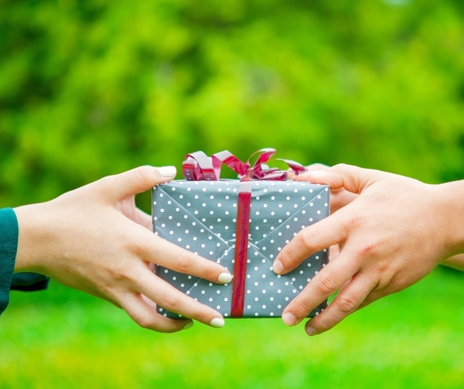 image of gift giving illustrating discomfort with giving and receiving gifts